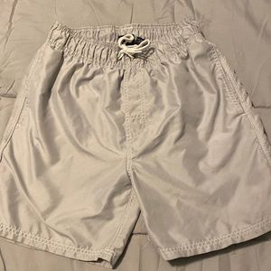 Retro swim trunks. Above knee fit